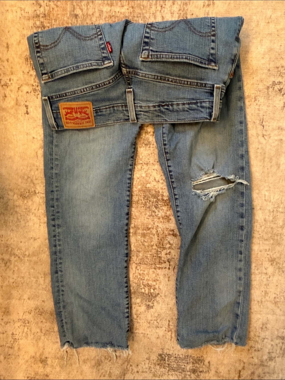 Levi's Light Blue Slim Straight women's  Jeans with Distressed Knee
